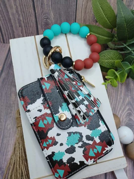 Christmas Candle Warmth PREORDER - Cow Print Western Themed Beaded Wristlet Wallet