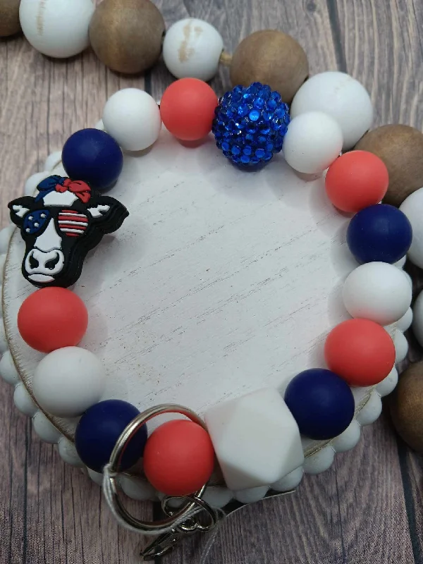 Christmas Reindeer Bells Red, White, & Blue Cow Beaded Wristlet