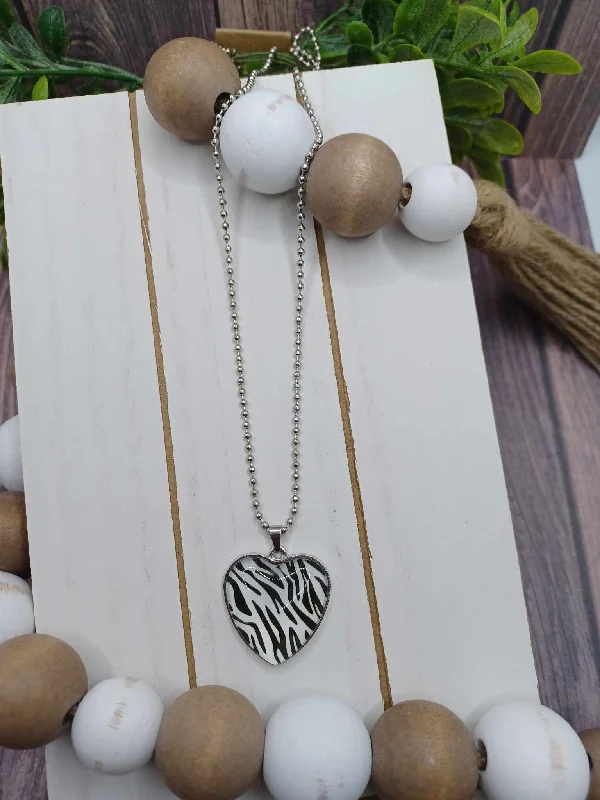 Christmas Warm Glow Silver Zebra Print Heart Pendant