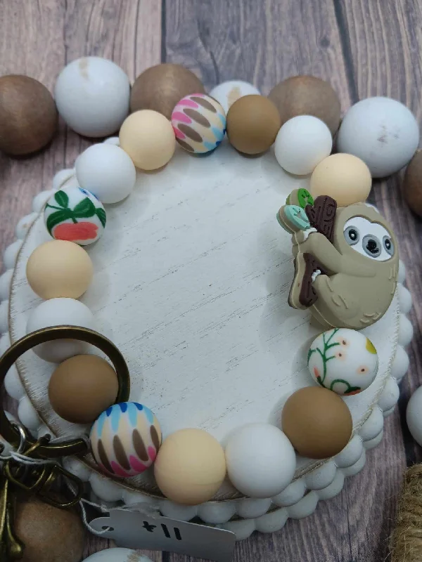 Christmas Jolly Surprises Sloth Beaded Wristlet