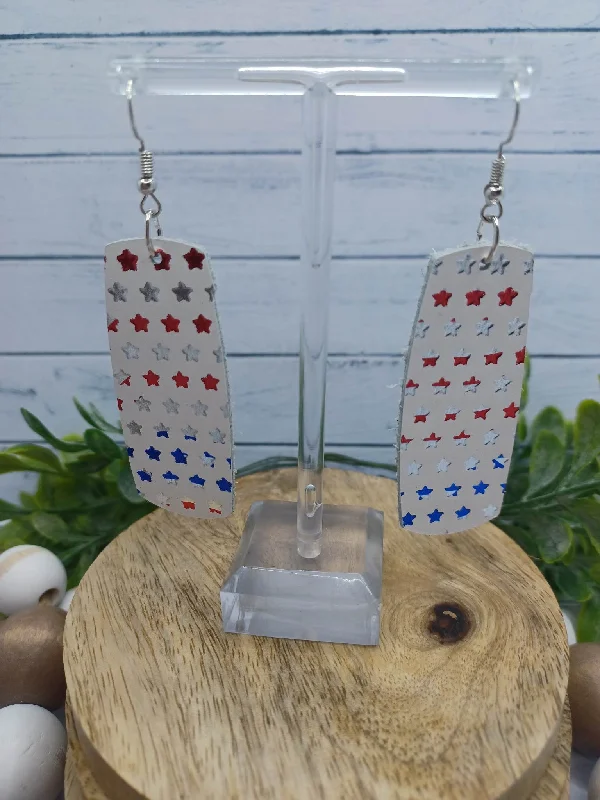 Christmas Holiday Candlelight White Leather Style Earrings w/ Red, White, & Blue Stars