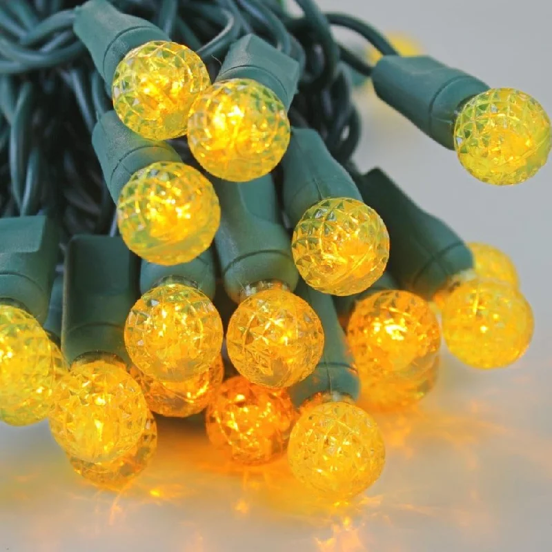 Christmas Mistletoe Magic 50-light  G12 Yellow LED Christmas Lights, 4" Spacing Green Wire