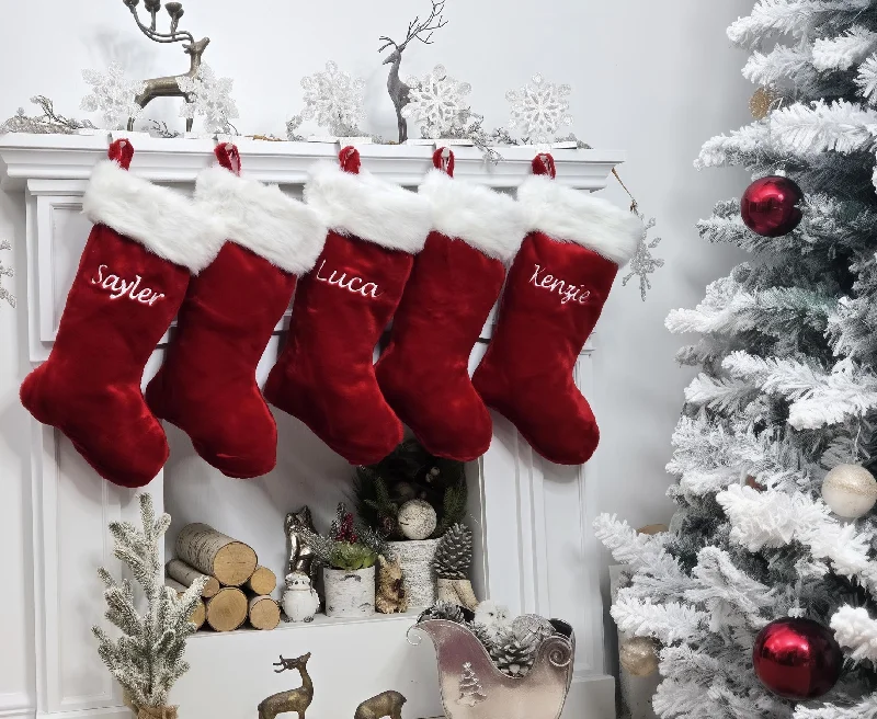 Christmas Sweet Treats This luxurious plush 21'' Christmas stocking is a deep burgundy color with faux fox fur trim.